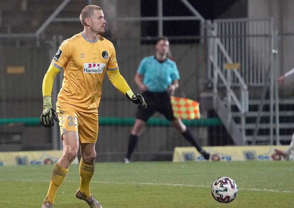 Bleibt Torwart Lukas Raeder mit Lübeck gegen Meppen ohne Gegentreffer? © imago images / Nordphoto, 15.12.2020 Luebeck - Meppen Tipp